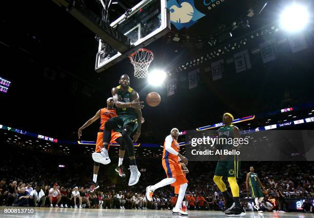 Rasual Butler of the Ball Hogs looks to pass against Allen Iverson of 3's Company during week one of the BIG3 three on three basketball league at...