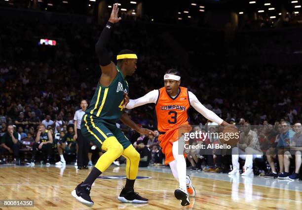 Allen Iverson of 3's Company handles the ball against Derrick Byars of the Ball Hogs during week one of the BIG3 three on three basketball league at...