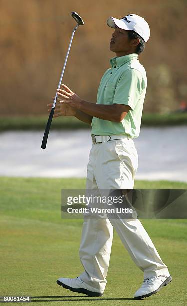 Taichiro Kiyota of Japan reacts after missing a putt on the 16th green during the final round of the 2008 Johnnie Walker Classic held at The DLF Golf...