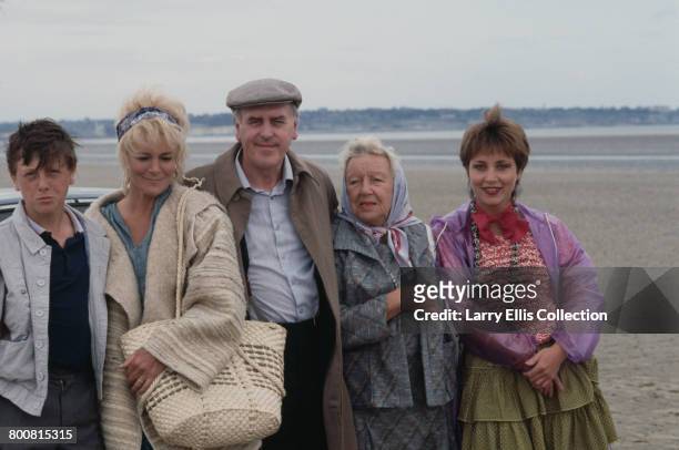English actor George Cole pictured in centre in character as Reg Dudgeon with fellow actors, from left, David Garlick, Barbara Ewing, Doris Hare and...