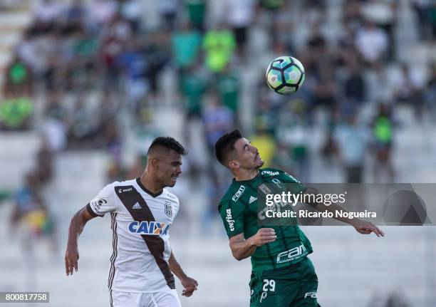 Willian of Palmeiras battles for the ball with Fernando Bob of Ponte Preta during the match between Ponte Preta and Palmeiras as a part of Campeonato...