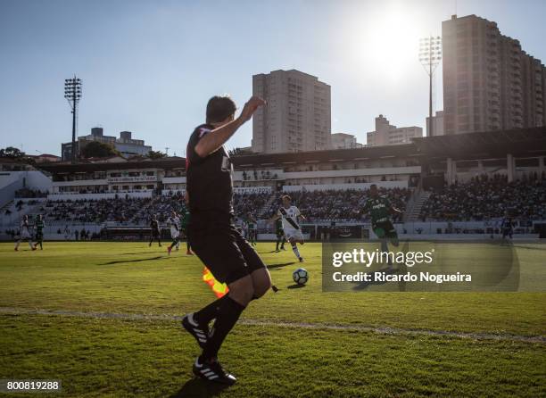 Yerry Mina of Palmeiras battles for the ball with Renato Caja of Ponte Preta during the match between Ponte Preta and Palmeiras as a part of...