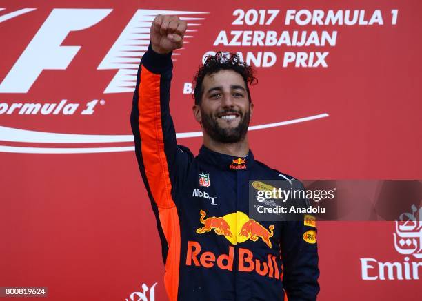 Pilot Daniel Ricciardo of Australia and Red Bull Racing celebrates his victory after the Azerbaijan Formula One Grand Prix at Baku City Circuit on...