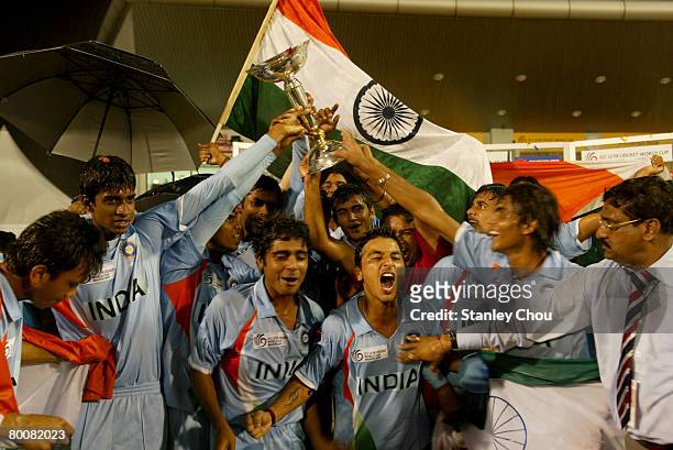 India celebrates after winning the World Cup during the ICC U/19 Cricket World Cup Final match between India and South Africa held at the Kinrara...