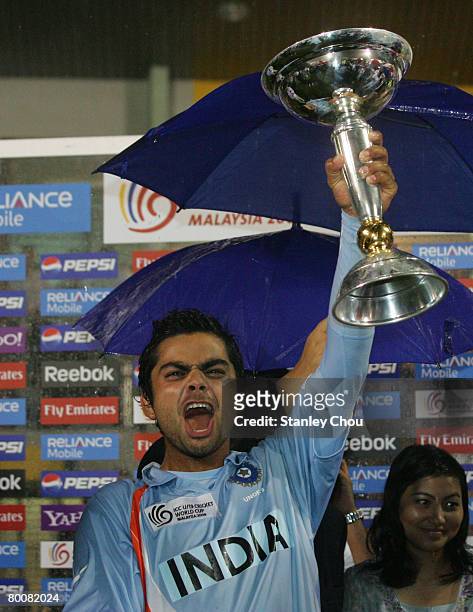 Virat Kohli captain of India lifts aloft the World Cup after india defeated South Africa at the ICC U/19 Cricket World Cup Final match between India...