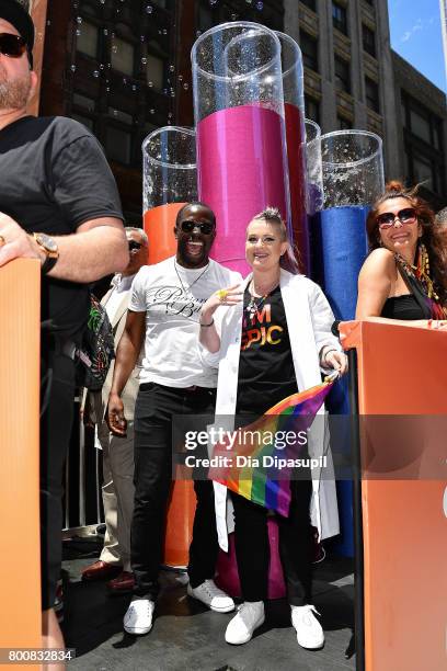 Gbenga Akinnagbe Kelly Osbourne ride the amfAR #BeEpicEndAIDS float during the 2017 New York City Pride March on June 25, 2017 in New York City.