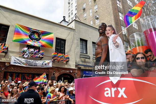 Gbenga Akinnagbe Kelly Osbourne ride the amfAR #BeEpicEndAIDS float during the 2017 New York City Pride March on June 25, 2017 in New York City.