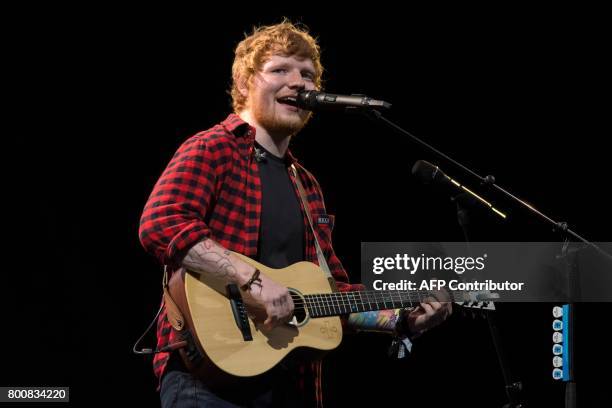 Ed Sheeran performs on the Pyramid Stage at the Glastonbury Festival of Music and Performing Arts on Worthy Farm near the village of Pilton in...