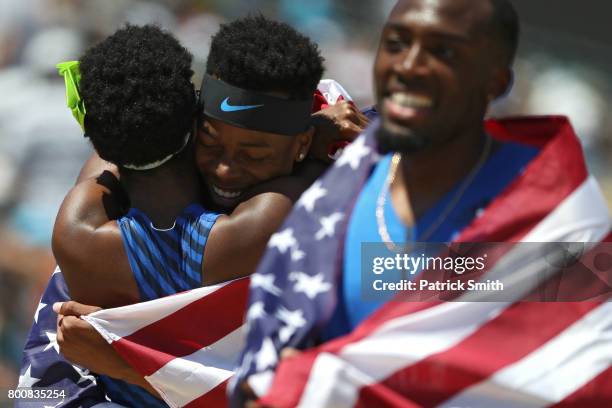 Holmes and Shamier Little embrace after the Women's and Men's 400m Hurdles Finals during Day 4 of the 2017 USA Track & Field Outdoor Championships at...