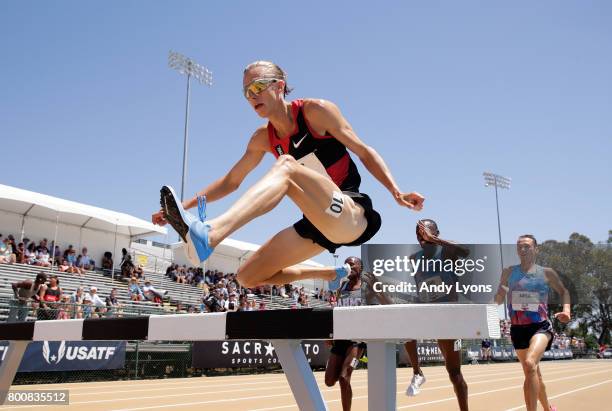 Evan Jager clears a hurdle on his way to win the Men's 3,000 Meter Steeplechase Final during Day 4 of the 2017 USA Track & Field Championships at...