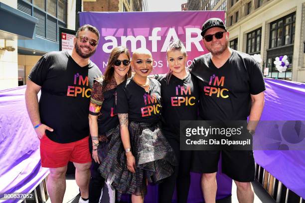 AmfAR vice president of Development Eric Muscatell, Aileen Getty, Ongina, Kelly Osbourne, and amfAR CEO Kevin Frost ride the amfAR #BeEpicEndAIDS...