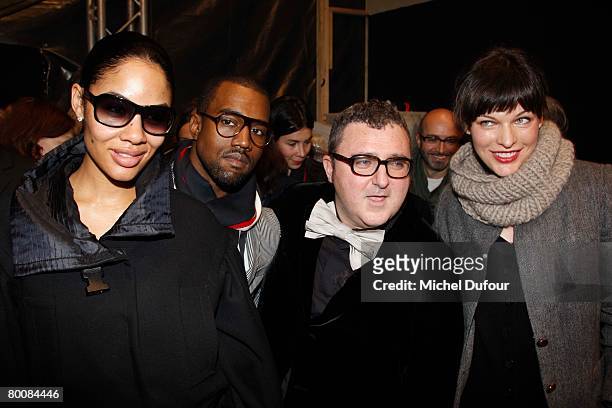 Alexi Pfeiffer, Kanye West, Alber Elbaz and Milla Jovovich attend the Lanvin Fashion show during Paris Fashion Week Fall-Winter 2008-2009 on March 2,...