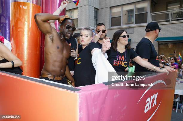 Kelly Osbourne and Gbenga Akinnagbe participates in the The March at the New York City Pride 2017 on June 25, 2017 in New York City.