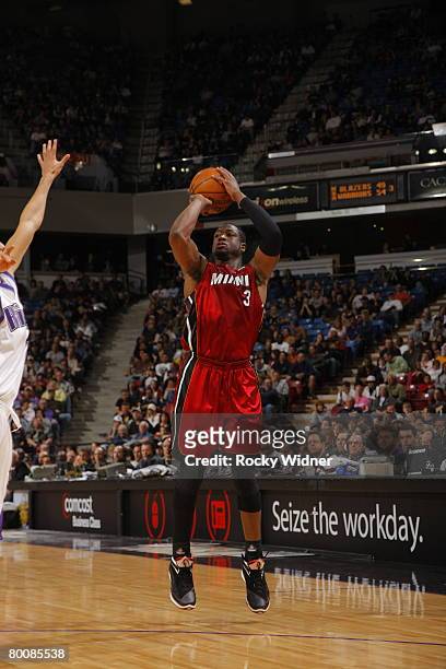 Dwyane Wade of the Miami Heat shoots the ball against the Sacramento Kings on March 2, 2008 at ARCO Arena in Sacramento, California. NOTE TO USER:...
