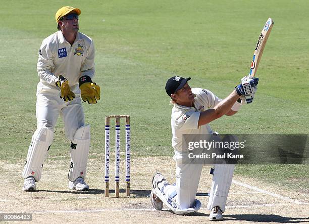 Cameron White of the Bushrangers hits out during day four of the Pura Cup match between the Western Australian Warriors and the Victorian Bushrangers...