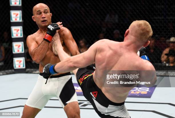 Dennis Siver of Germany kicks BJ Penn in their featherweight bout during the UFC Fight Night event at the Chesapeake Energy Arena on June 25, 2017 in...