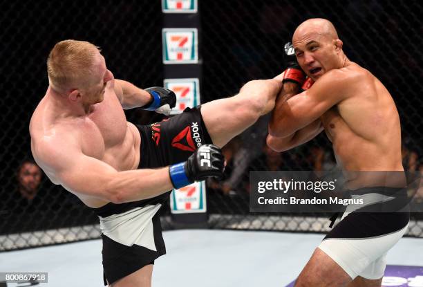 Dennis Siver of Germany kicks BJ Penn in their featherweight bout during the UFC Fight Night event at the Chesapeake Energy Arena on June 25, 2017 in...