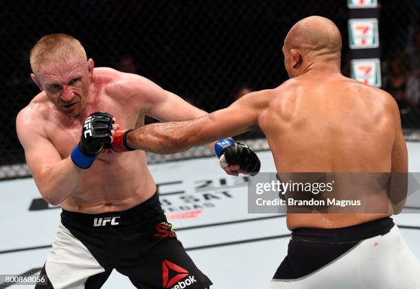 Penn punches Dennis Siver of Germany in their featherweight bout during the UFC Fight Night event at the Chesapeake Energy Arena on June 25, 2017 in...