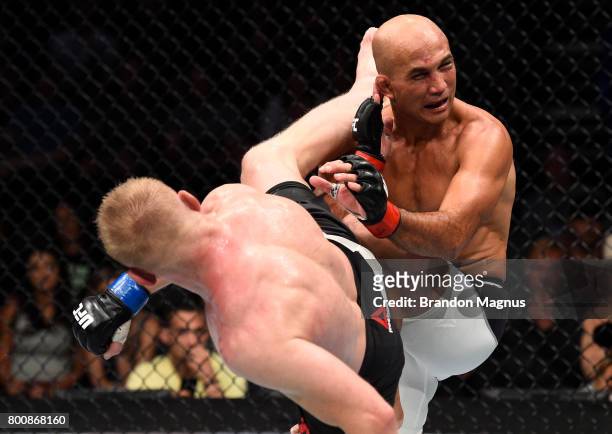 Dennis Siver of Germany kicks BJ Penn in their featherweight bout during the UFC Fight Night event at the Chesapeake Energy Arena on June 25, 2017 in...