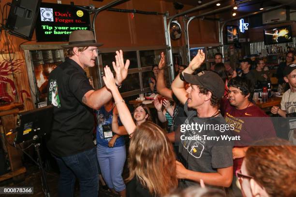 Singer-songwriter Jerrod Niemann enjoys karaoke Night with ACM Lifting Lives music campers at Winner's Bar on June 25, 2017 in Nashville, Tennessee.