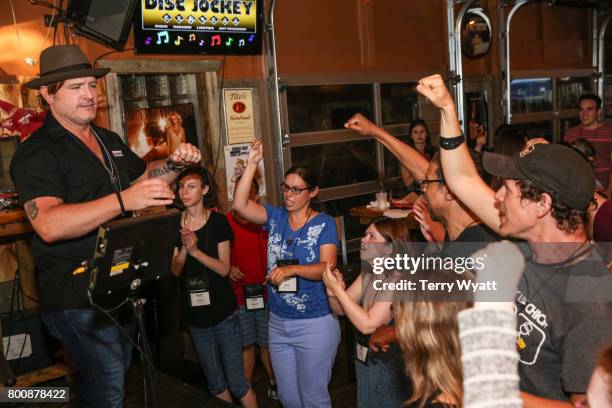 Singer-songwriter Jerrod Niemann enjoys karaoke Night with ACM Lifting Lives music campers at Winner's Bar on June 25, 2017 in Nashville, Tennessee.