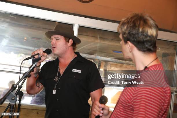 Singer-songwriter Jerrod Niemann enjoys karaoke Night with ACM Lifting Lives music campers at Winner's Bar on June 25, 2017 in Nashville, Tennessee.