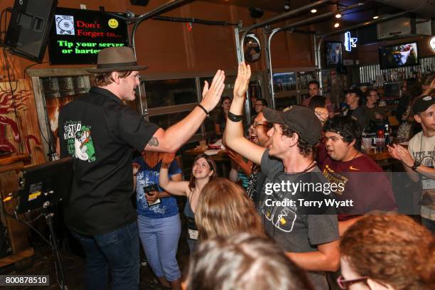 Singer-songwriter Jerrod Niemann enjoys karaoke Night with ACM Lifting Lives music campers at Winner's Bar on June 25, 2017 in Nashville, Tennessee.