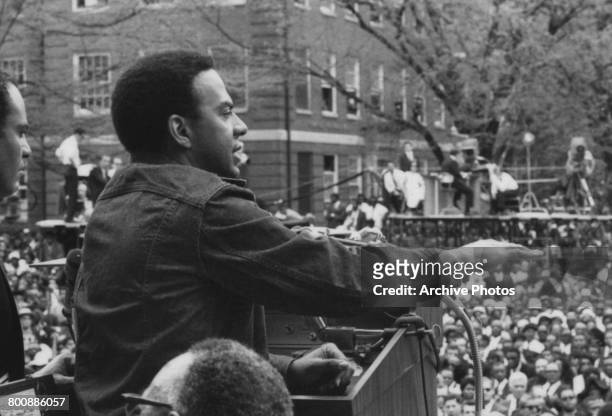 Civil rights activist Andrew Young addressing the crowd at the funeral of assassinated American civil rights leader Martin Luther King Jr , Atlanta,...