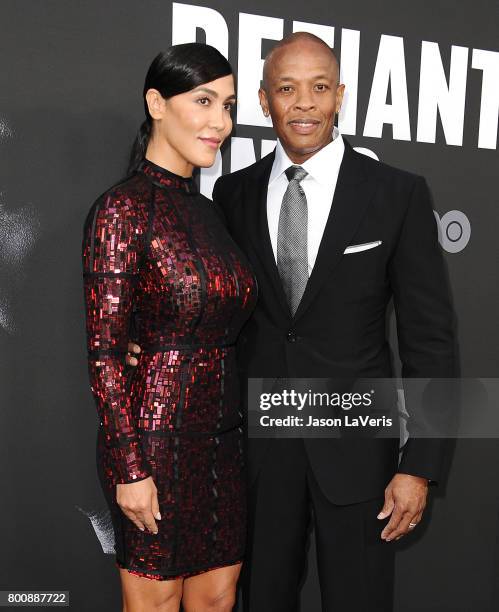 Dr. Dre and wife Nicole Young attend the premiere of "The Defiant Ones" at Paramount Theatre on June 22, 2017 in Hollywood, California.