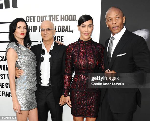 Liberty Ross, Jimmy Iovine, Nicole Young and Dr. Dre attend the premiere of "The Defiant Ones" at Paramount Theatre on June 22, 2017 in Hollywood,...