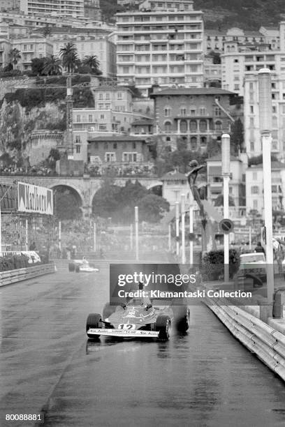 Austrian racing driver Niki Lauda driving the Ferrari 312T during a wet Monaco Grand Prix, Monte Carlo, 11th May 1975. Lauda won this rain-shortened...