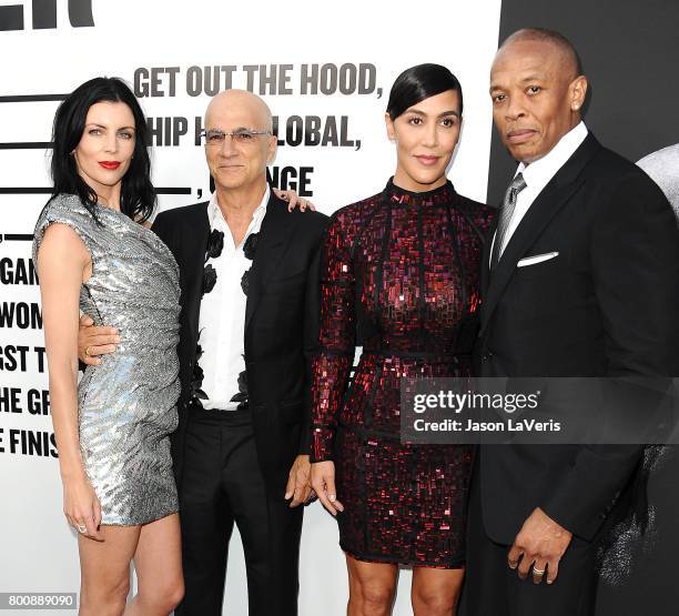 Liberty Ross, Jimmy Iovine, Nicole Young and Dr. Dre attend the premiere of "The Defiant Ones" at Paramount Theatre on June 22, 2017 in Hollywood,...