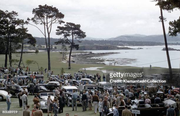 Pebble Beach Concours d'Elegance at Pebble Beach Lodge, 1954. Under overcast skies is this famous concours in its earliest days. Most of the cars are...