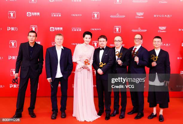 Jury Japanese director Sabu, USA/Macedonian director Milcho Manchevski, Chinese actress Xu Qing, Romanian director Cristian Mungiu, Chinese director...
