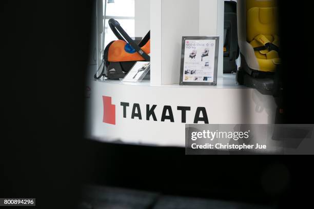 Takata Corp. Logo is seen on a display of child safety seats at a car showroom on June 26, 2017 in Tokyo, Japan. Japanese air bag maker Takata Corp....