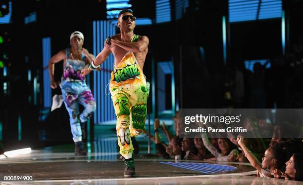 Keith Powers and Bryshere Y. Gray of the adult cast of 'The New Edition Story' perform onstage at 2017 BET Awards at Microsoft Theater on June 25,...