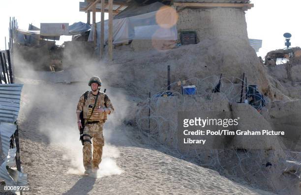 Prince Harry on patrol through the deserted town of Garmisir close to FOB Delhi, where he was posted in the Helmand province, on January 2, 2008 in...