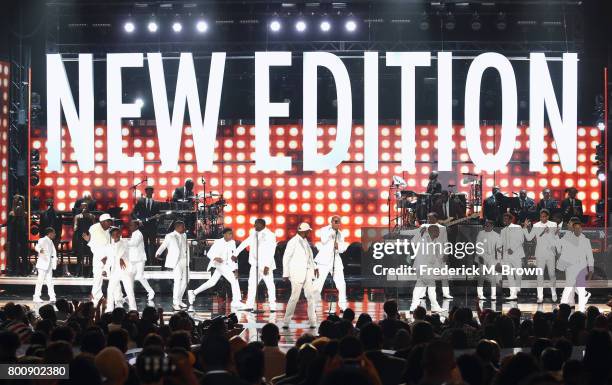 Young and adult cast members of 'The New Edition Story' and original members of New Edition perform onstage at 2017 BET Awards at Microsoft Theater...