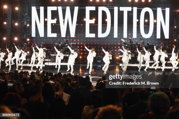 Young and adult cast members of 'The New Edition Story' and original members of New Edition perform onstage at 2017 BET Awards at Microsoft Theater...