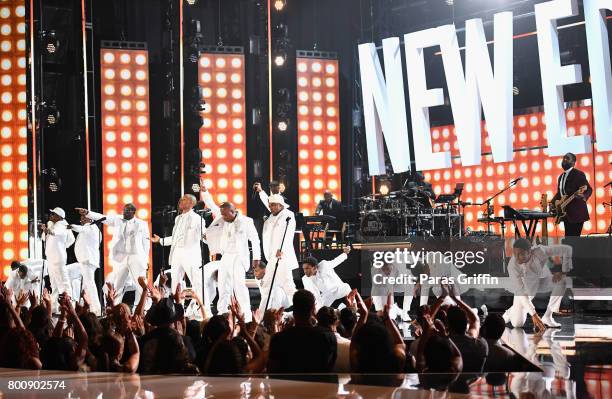 Young and adult cast members of 'The New Edition Story' and original members of New Edition perform onstage at 2017 BET Awards at Microsoft Theater...