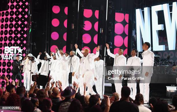 Young and adult cast members of 'The New Edition Story' and original members of New Edition perform onstage at 2017 BET Awards at Microsoft Theater...