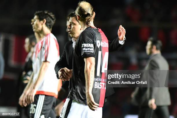 Marcelo Gallardo, coach of River Plate shakes hands with Adrian Bastia of Colon after a match between Colon and River Plate as part of Torneo Primera...