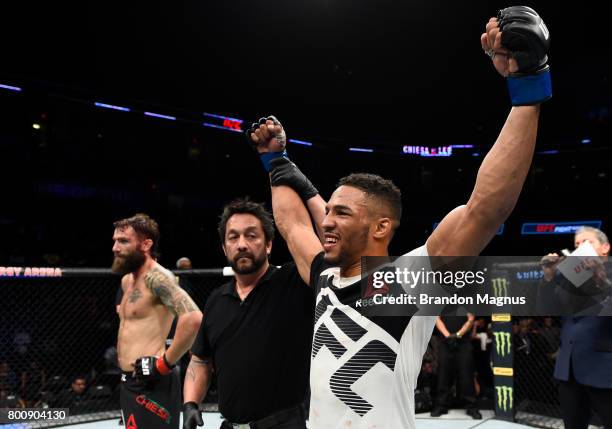 Kevin Lee celebrates after his submission victory over Michael Chiesa in their lightweight bout during the UFC Fight Night event at the Chesapeake...