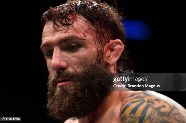 Michael Chiesa reacts after his submission loss to Kevin Lee in their lightweight bout during the UFC Fight Night event at the Chesapeake Energy...