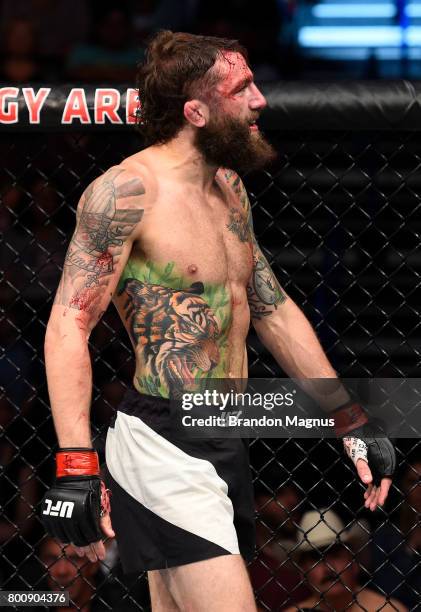 Michael Chiesa reacts after his submission loss to Kevin Lee in their lightweight bout during the UFC Fight Night event at the Chesapeake Energy...