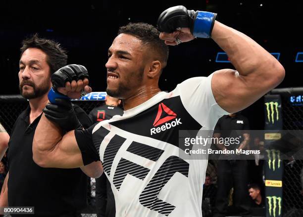 Kevin Lee celebrates after his submission victory over Michael Chiesa in their lightweight bout during the UFC Fight Night event at the Chesapeake...