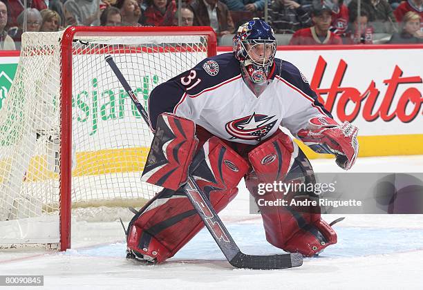 Pascal Leclaire of the Columbus Blue Jackets guards his net against the Montreal Canadiens at the Bell Centre on February 23, 2008 in Montreal,...