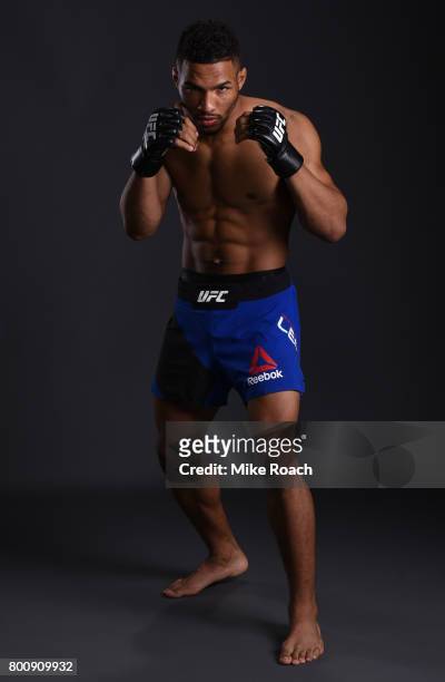 Kevin Lee poses for a portrait backstage after his victory over Michael Chiesa during the UFC Fight Night event at the Chesapeake Energy Arena on...
