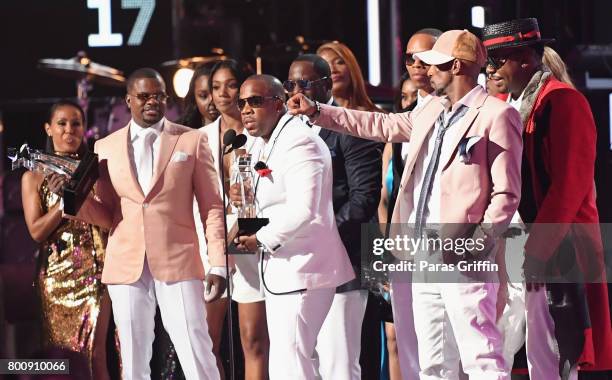 Ricky Bell, Bobby Brown, Johnny Gill, Ronnie DeVoe, Michael Bivins and Ralph Tresvant of New Edition accept the Lifetime Achievement Award onstage at...