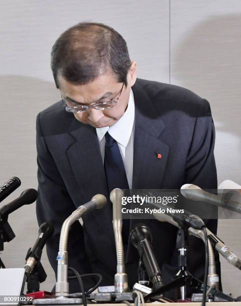 Takata Corp. Chairman and Chief Executive Officer Shigehisa Takada bows in apology at a press conference in Tokyo on June 26 after the auto parts...